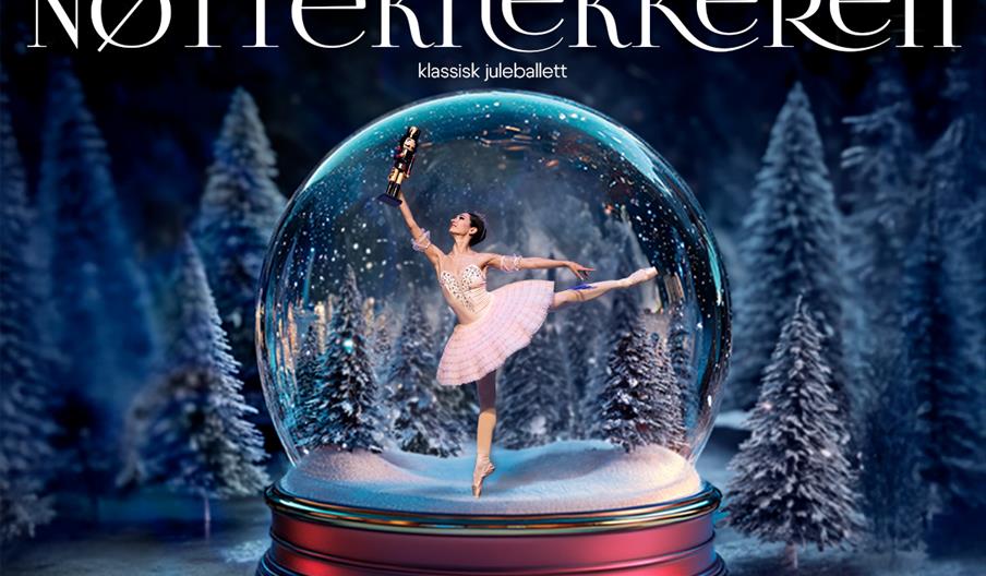 ballettdanserinne inni en snøkule