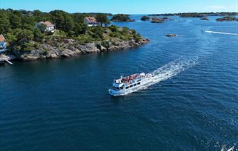 Bli med på en rundtur rundt Hisøya og ut i Raet Nasjonalpark med MS Nidelv