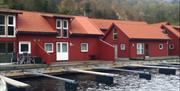 Røde hytter lands brygga