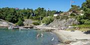 En av badestrendene i Stølsviga - Hisøy i Arendal