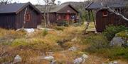 Turisthytter på fjellet ved en bekk. kalt Granbustøyl