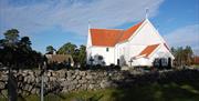 steinkirken på Tromøy fra 1150-tallet. sett utenfra