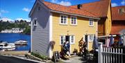 Yellow House with Red Roof - A Colorful Architectural Wonder