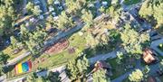 Oversikt over campingplassen, lekeplassen og hyttene på Topcamp Sjøsanden