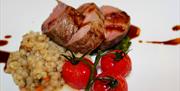 indrefilet med risotto og cherrytomater