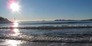 Bølgeskvulp på stranden Sjøsanden