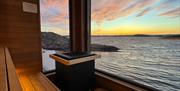 Nyt solnedgangen i Smeigedag Sauna på Kristiansand Feriesenter